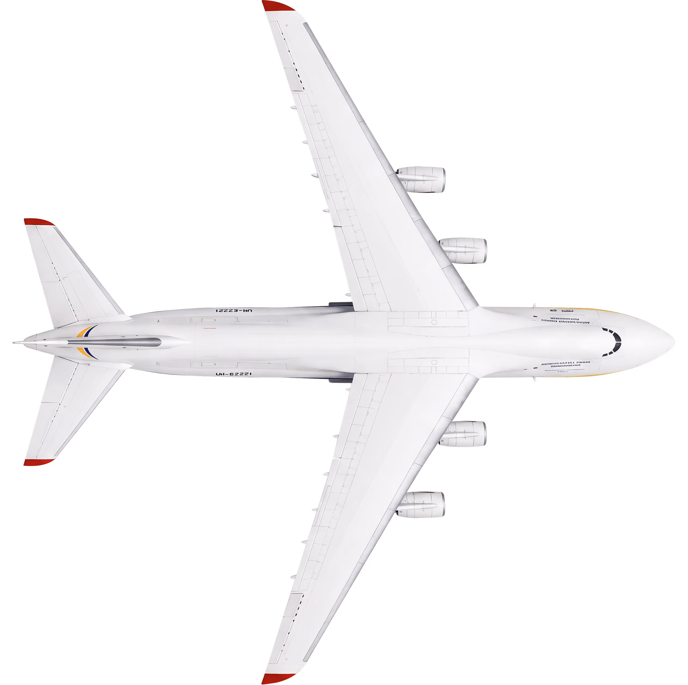 Top view of a white commercial airplane with four engines and red tips on wings and tail.